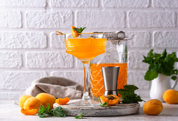 Fresh apricot Bellini cocktail with mint