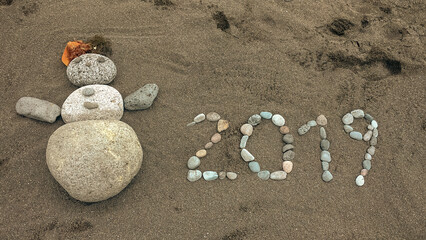 Stone snowman in 2019 on the tenerife seaside