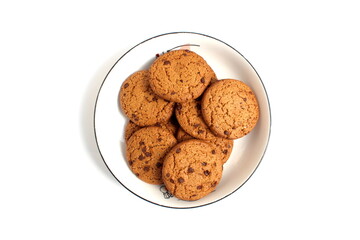 There are a lot of oatmeal cookies on the plate.