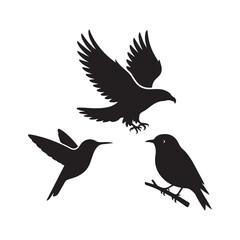 Fototapeta premium Three silhouettes of birds in flight and perched isolated on white background