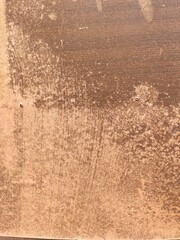 Worn brown grunge texture on rough surface for vintage backgrounds and artistic overlays