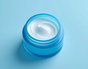 Open cosmetic cream jar top view – beauty skincare product on clean background