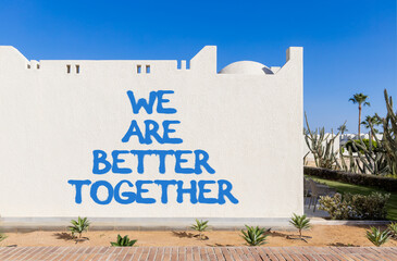 We are better together symbol. Concept words phrase We are better together on beautiful white wall....