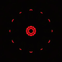 Red neon lights create circular pattern on black background