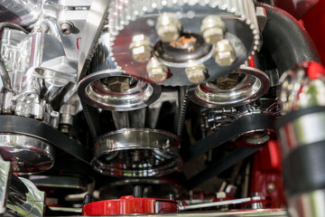 Central view of the engine bay of a vintage car. Mechanical details in focus.