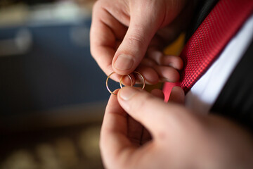 Groom Holding Wedding Rings Before Ceremony