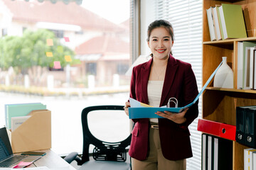 Asian business woman Business document check, account check, document search Legal documents, document preparation, reports, tax analysis, time, accounting, data sheets
