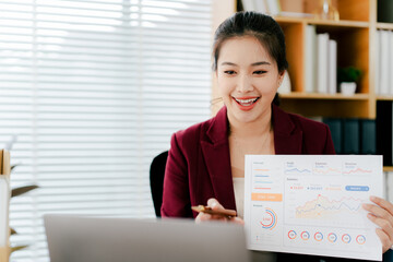 Young woman in online meeting using laptop. Young woman studying online.