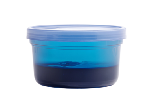 Blue container filled partially with dark substance inside