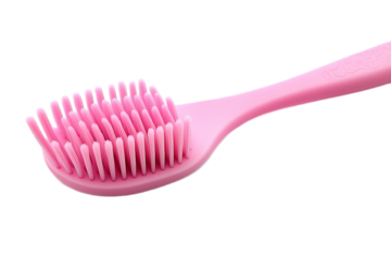Single pink toothbrush on white background, beauty tool