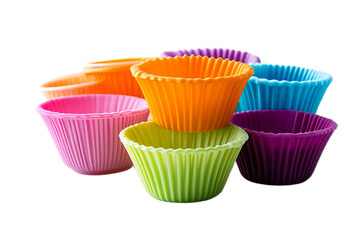 Colorful silicone cupcake molds against a white backdrop
