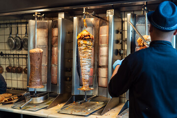Delicious and authentic Greek gyros pita wraps with both chicken and pork, packed with fresh tomatoes, onions, and tzatziki sauce. A classic Athens street food experience, perfect for foodies.