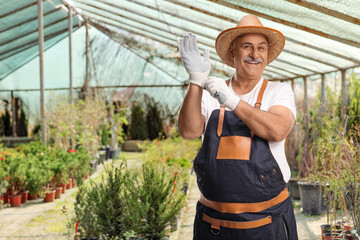Man working in a greenhouse