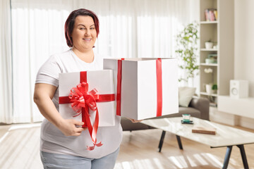 Plus size woman holding a present