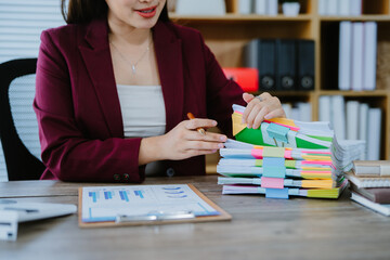 Auditor business woman Business Documents checking searching document legal prepare paperwork or...