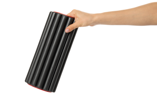 Black foam roller in hand – isolated on transparent background, PNG, front view - Powered by Adobe