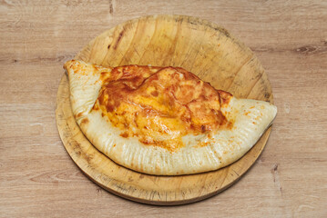 The calzone is essentially a pizza folded in half