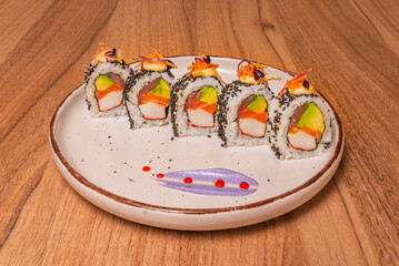 The California Roll, with its avocado, cucumber, and surimi (or king crab) filling, was one of the first