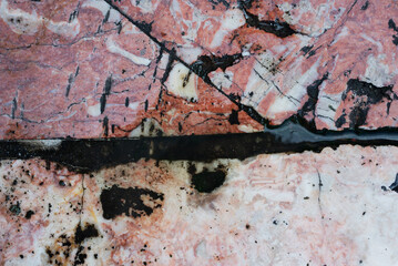 Pink marble floor. Granite. Wet rain texture. Background for projects.