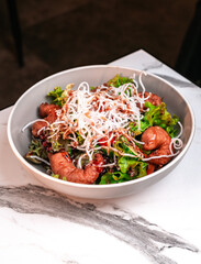 Crispy Popcorn Shrimp Salad with Greens and Fried Rice Noodles in Bowl
