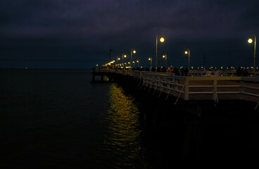 Beautiful old wooden pier in Sopot at night	