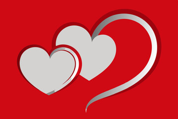 urved metallic hearts on fuzzy red felt