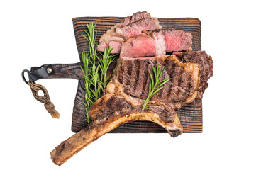 BBQ fried Tomahawk beef steak, grilled marbled rib eye with bone on wooden board isolated on white...