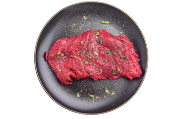 Marinated Flank or Flap steak, raw beef meat with thyme and spices on plate isolated on white background. top view