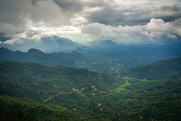 Scenic stormy landscape taken form Ambuluwawa Tower, Sri Lanka`s first multi religious center built on top of a solitary mountain near Kandy and Gampola, Sri Lanka, Asia