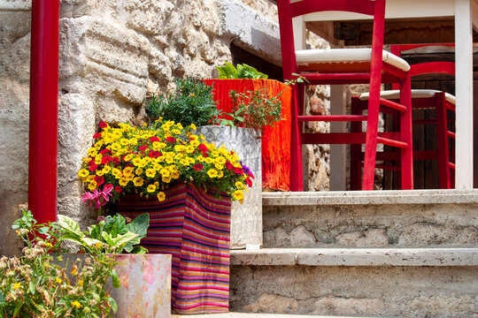 Greek city Afitos with old and authentic houses, greek taverna, siesta concept.