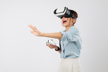 VR game experience as young Asian woman touches imaginary digital VR game interface with palm while playing using controller in virtual world. isolated studio white background