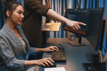Serious of IT developers discussing intelligent website development coder system running data...