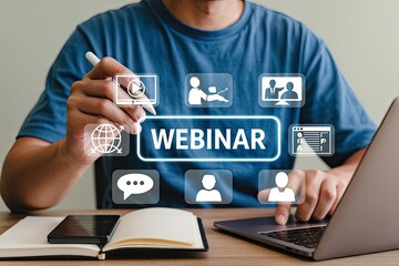 Man using a stylus to interact with a digital interface displaying the word webinar and various online learning icons