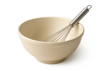 Whisk resting in empty mixing bowl on transparent background