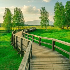 Fototapeta premium A high quality image of a weathered wooden boardwalk bridge gracefully winding through a lush green meadow.