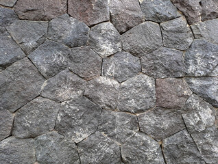 Stone wall texture. Old castle wall texture background. Stone wall as background or texture. Part of a stone wall, for background or texture	
