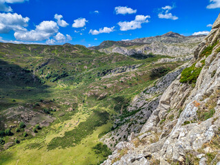 Obraz premium Meadows and El Cornon peak in background near Santa Maria del Puerto village, Somiedo Natural Park. Asturias. Spain