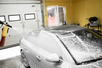High-pressure snow foam application ensures deep cleaning and softens grime on car surface. Car...
