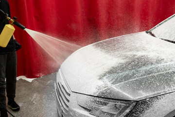 High-pressure snow foam application ensures deep cleaning and softens grime on car surface. Car...