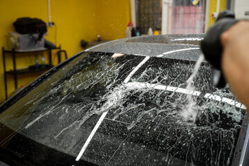 Reverse Osmosis Car Final Rinse. Pure reverse osmosis water is sprayed to eliminate mineral spots...