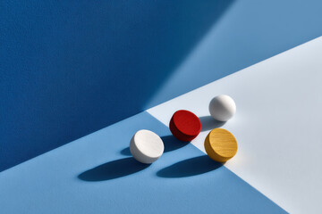 studio shot of various objects arranged artistically with focus on contrasting colors