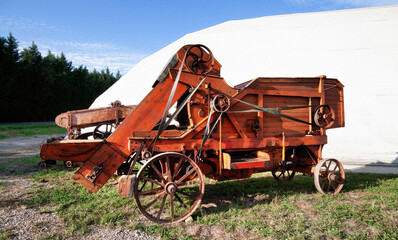 Ancient outdoor combine harvester.