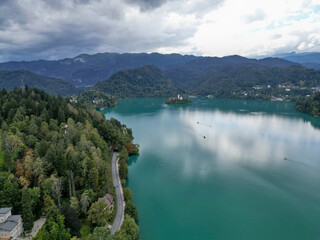 aerial view of lake bled slovenia (famous mountain lake in the julian alps with medieval castle on...