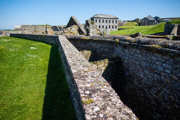Kinsale, Ireland, May 20, 2024: Charles Fort British Fortress Ruins on Kinsale Bay with Rock Walls and Ramparts making up the castle and the Bay Defence 