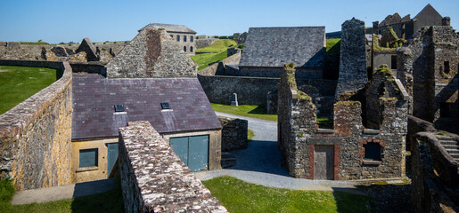 Kinsale, Ireland, May 20, 2024: Charles Fort British Fortress Ruins on Kinsale Bay with Rock Walls and Ramparts making up the castle and the Bay Defence 
