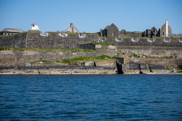 Kinsale, Ireland, May 20, 2024: Charles Fort British Fortress Ruins on Kinsale Bay with Rock Walls and Ramparts making up the castle and the Bay Defence  from the Bay
