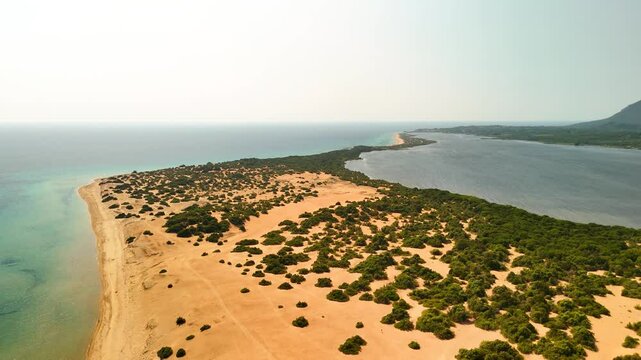 Aerial sea landscape of a wild sand beach in Corfu, Greece. Drone view of Issos Beach