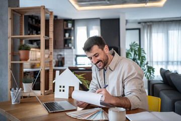 Architect choosing samples for house renovation project