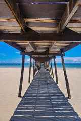 Under the wooden bridge at tropical beach, Koh Kood island