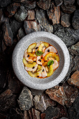 Scallop with Kiwi on stones